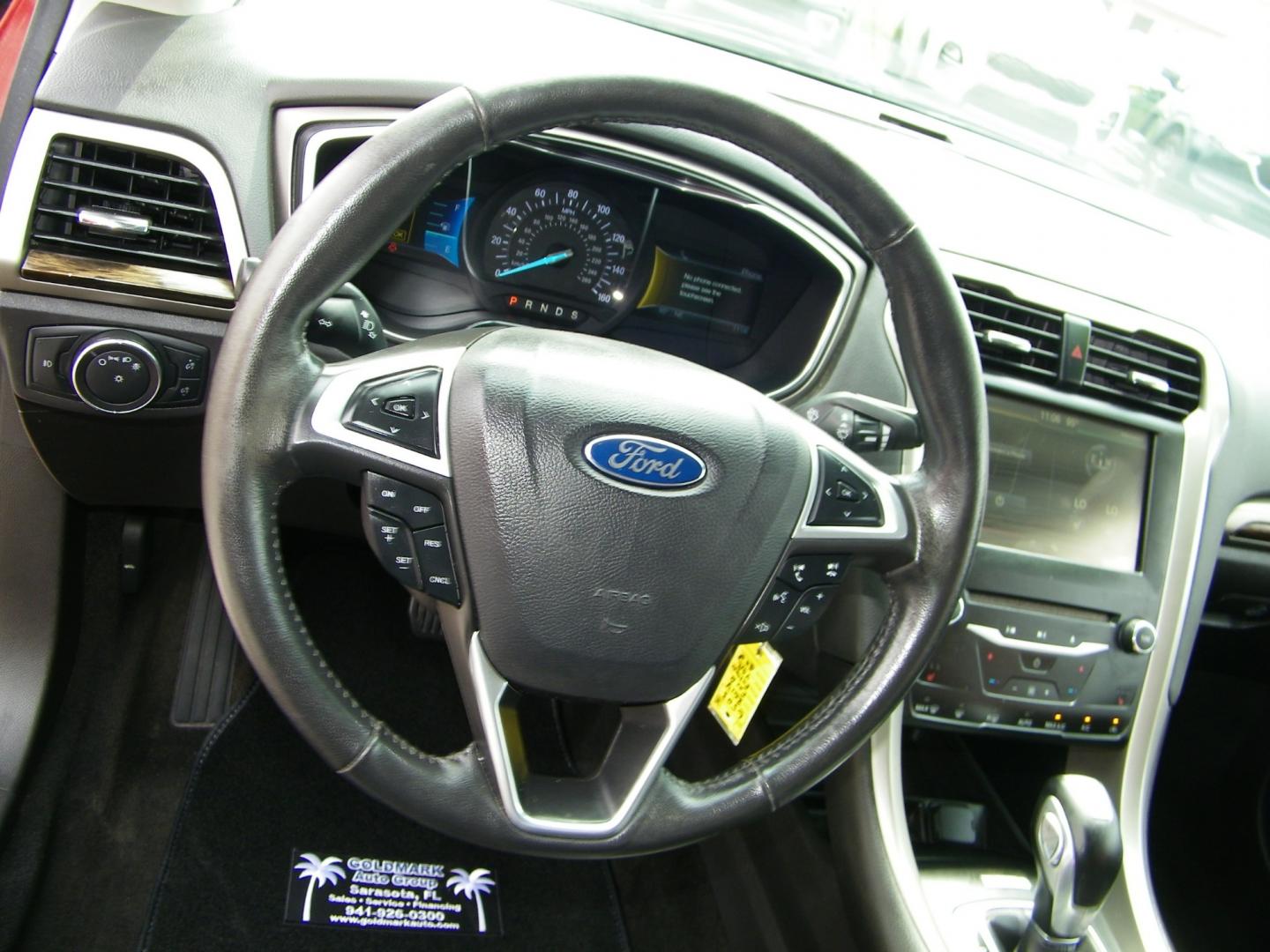 2014 Orange /Black Ford Fusion SE (3FA6P0HD7ER) with an 1.5L L4 DOHC 16V engine, Automatic transmission, located at 4000 Bee Ridge Road, Sarasota, FL, 34233, (941) 926-0300, 27.298664, -82.489151 - Photo#18